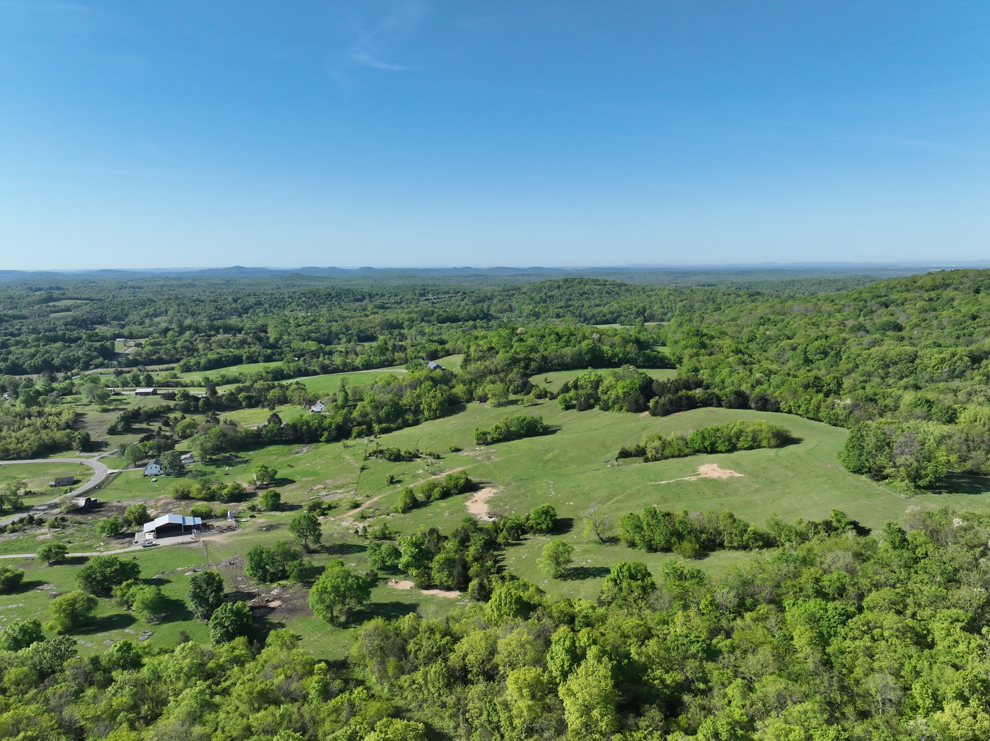 6180 Southeast Tater Peeler Road Lebanon, TN 37090 - Photo 88 of 89 an aerial view of residential houses with outdoor space