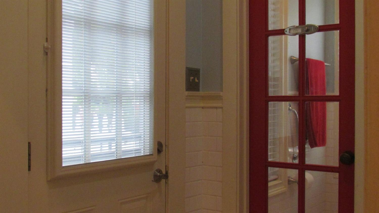 523 North Buttonwillow Avenue Reedley, CA 93654 - Photo 35 of 85 Hallbath has a door to the backyard for convenies & the red door leads to the gorgeous shower area....