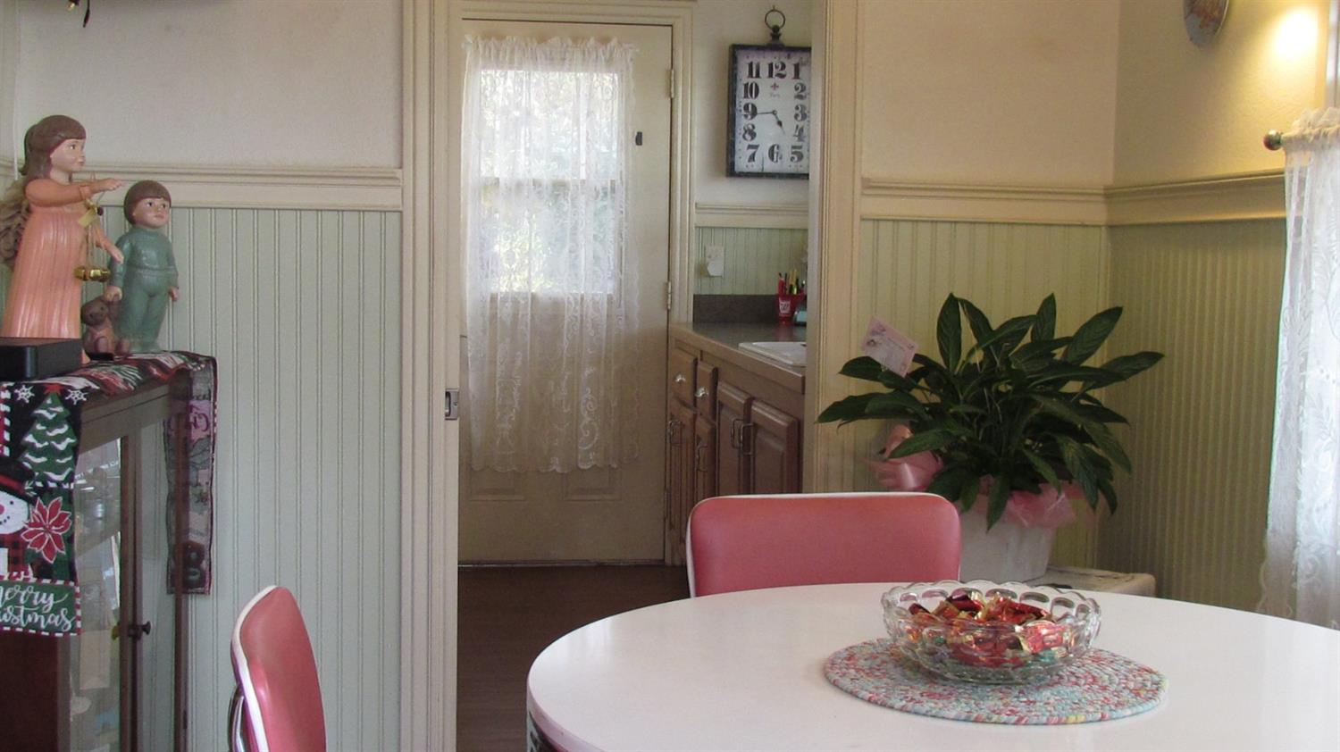 523 North Buttonwillow Avenue Reedley, CA 93654 - Photo 48 of 85 Sunny kitchen nook leads to the spacious laundry room....