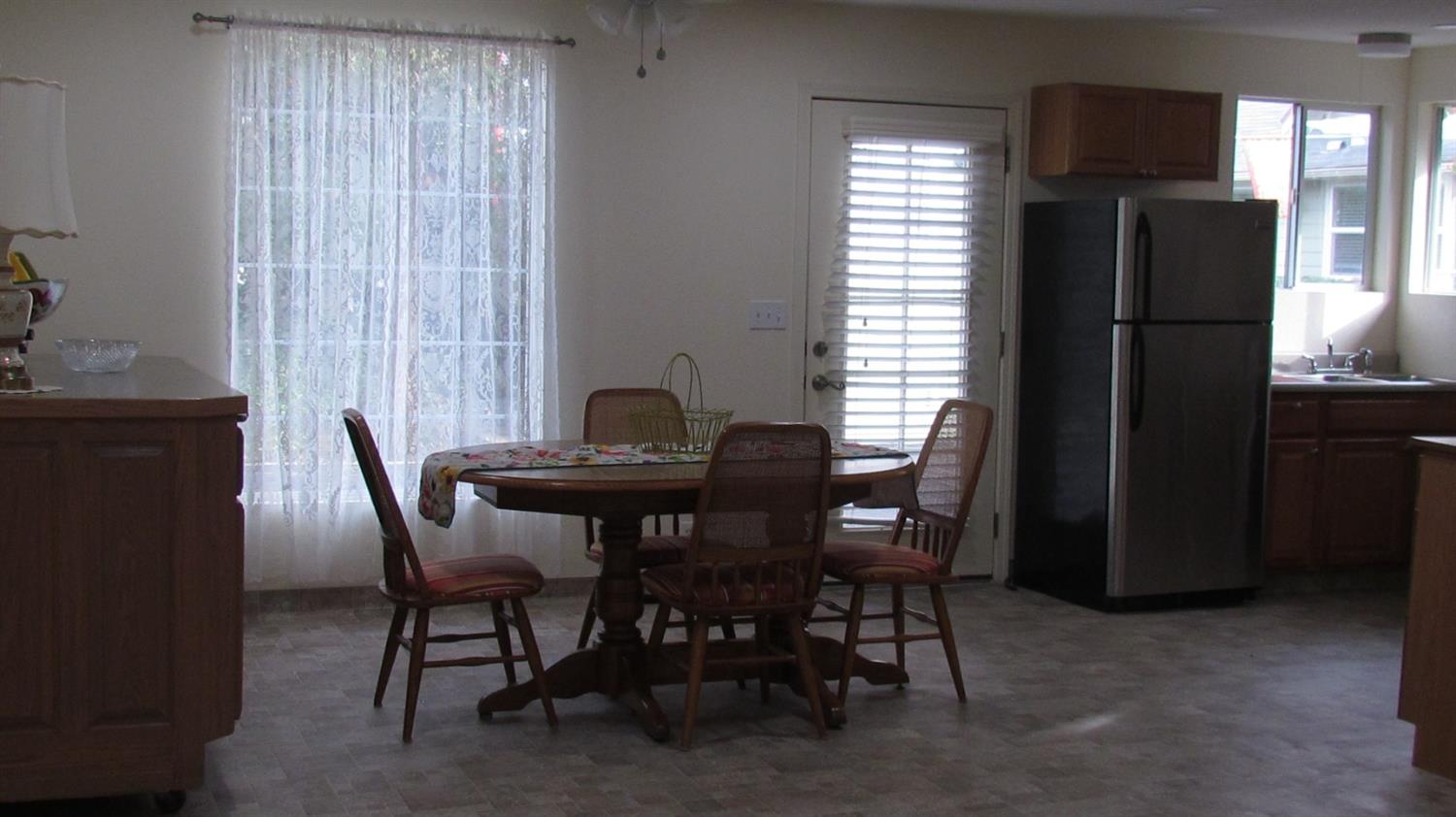 523 North Buttonwillow Avenue Reedley, CA 93654 - Photo 65 of 85 Dining area & buffet cabinet in the guest cottage.....