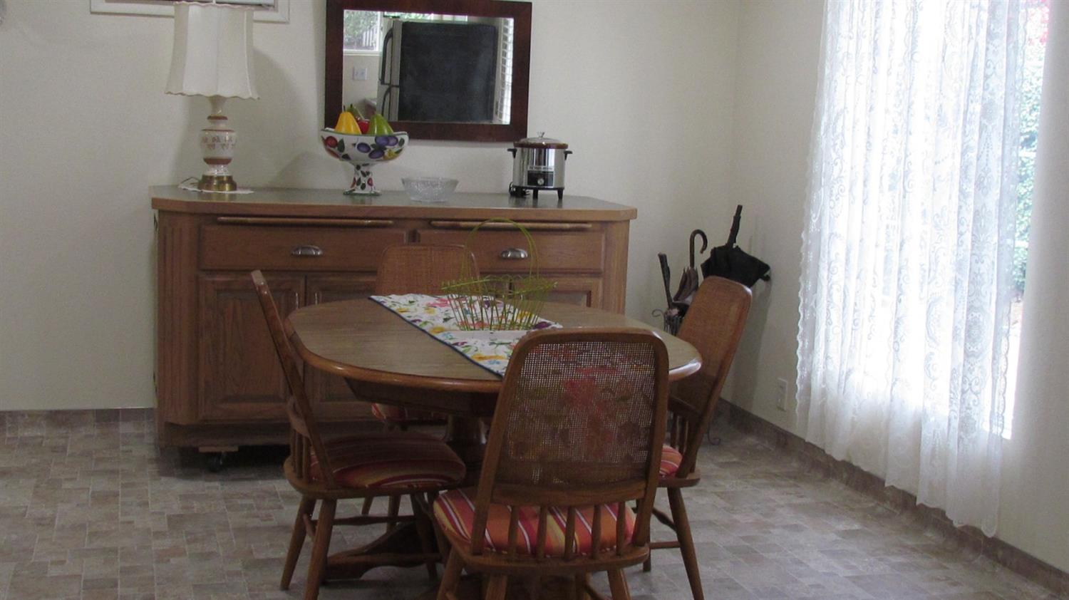 523 North Buttonwillow Avenue Reedley, CA 93654 - Photo 66 of 85 Bright & cheery dining area in the guest cottage for your guests to enjoy....