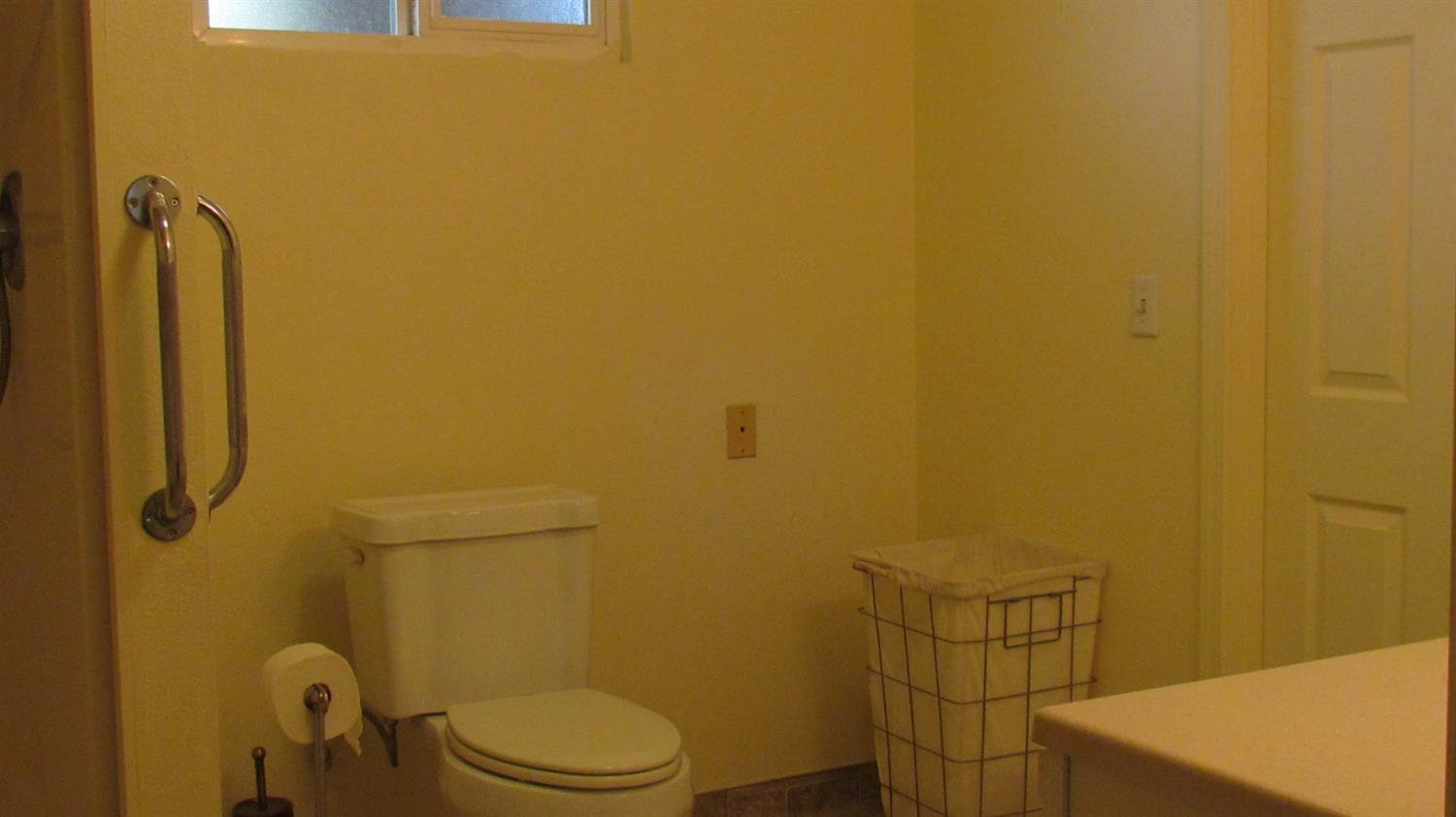 523 North Buttonwillow Avenue Reedley, CA 93654 - Photo 70 of 85 Lots of handles for convenience & safety in the bath in the guest cottage....