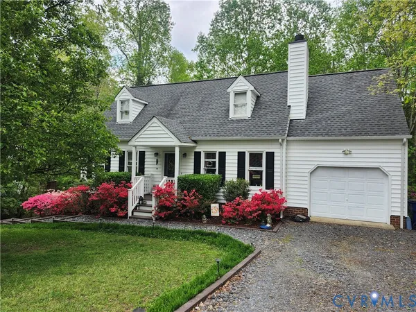 a front view of house with yard