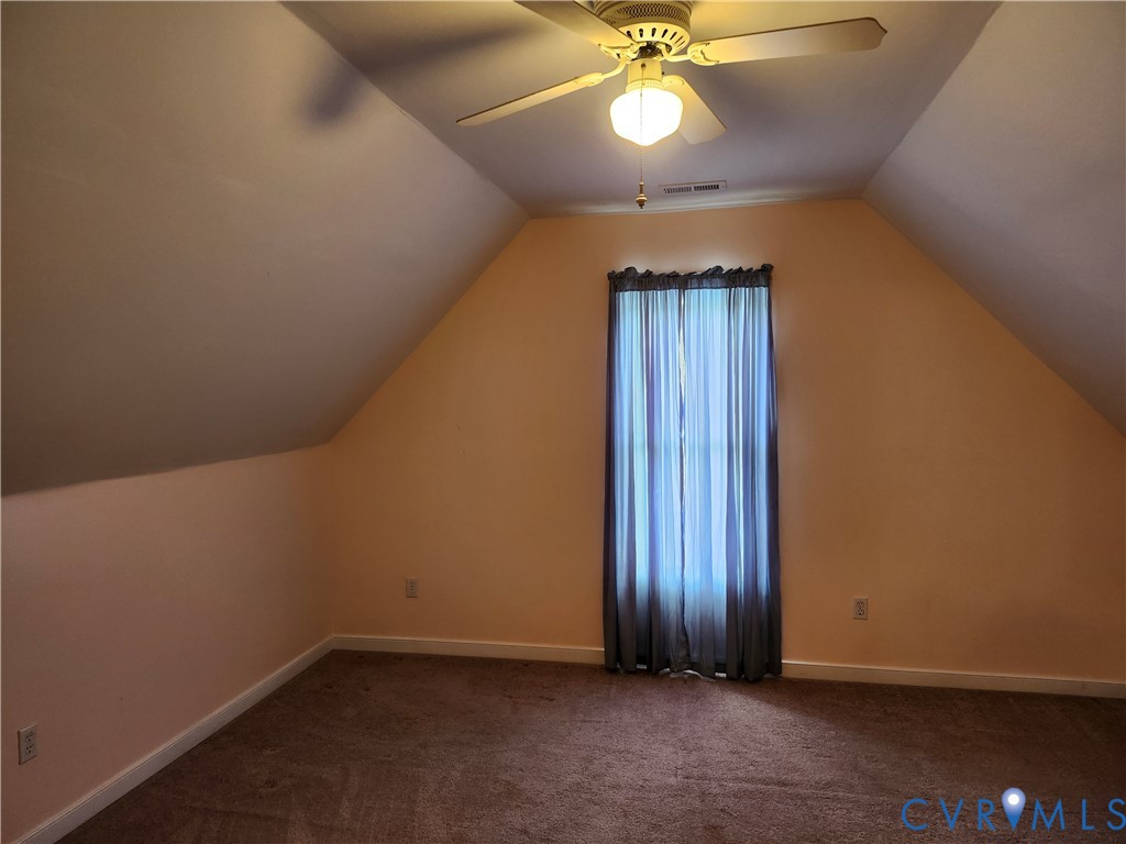 4419 Boones Bluff Way Chesterfield, VA 23832 - Photo 15 of 35 an empty room with windows and fan