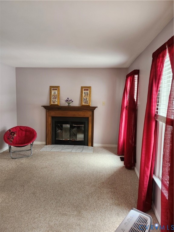 4419 Boones Bluff Way Chesterfield, VA 23832 - Photo 16 of 35 a living room with furniture and a fireplace