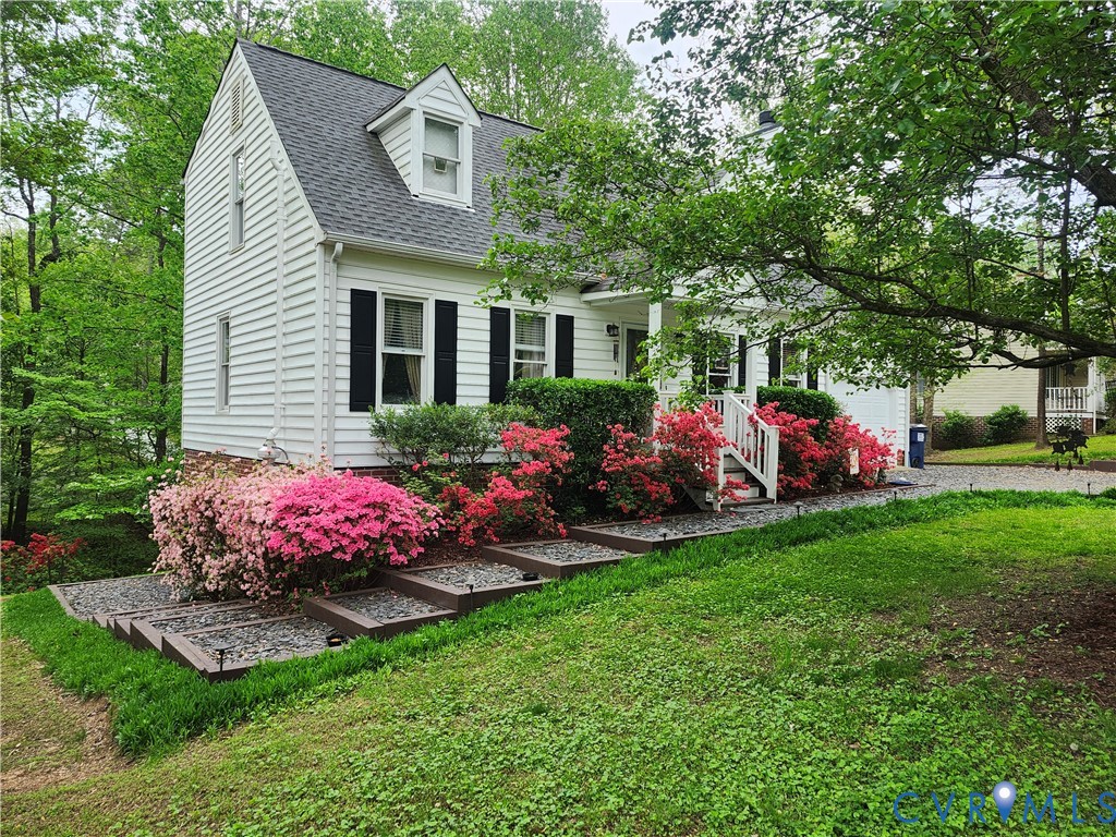 4419 Boones Bluff Way Chesterfield, VA 23832 - Photo 2 of 35 a front view of house with yard and outdoor seating