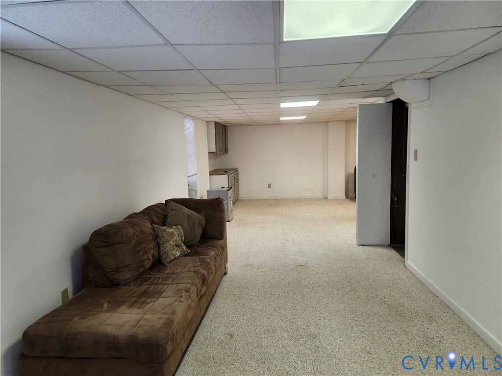 4419 Boones Bluff Way Chesterfield, VA 23832 - Photo 22 of 35 a living room with furniture and a ceiling fan