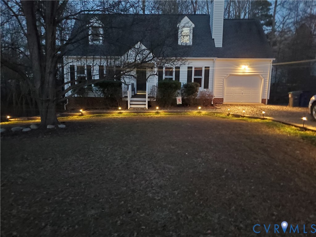 4419 Boones Bluff Way Chesterfield, VA 23832 - Photo 34 of 35 a front view of a house with swimming pool and porch with furniture