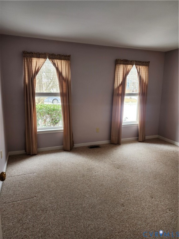 4419 Boones Bluff Way Chesterfield, VA 23832 - Photo 9 of 35 an empty room with windows and an outdoor view
