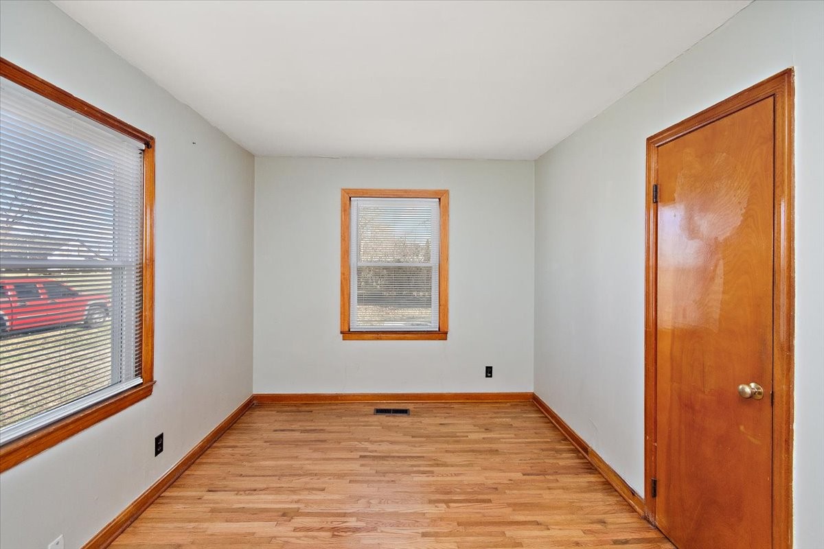 1087 Woods Ferry Road Gallatin, TN 37066 - Photo 20 of 30 a view of a room with wooden floor and windows