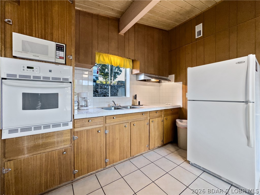 33303 Bass Point Road, Unit 14 Sunrise Beach, MO 65079 - Photo 9 of 34 Kitchen