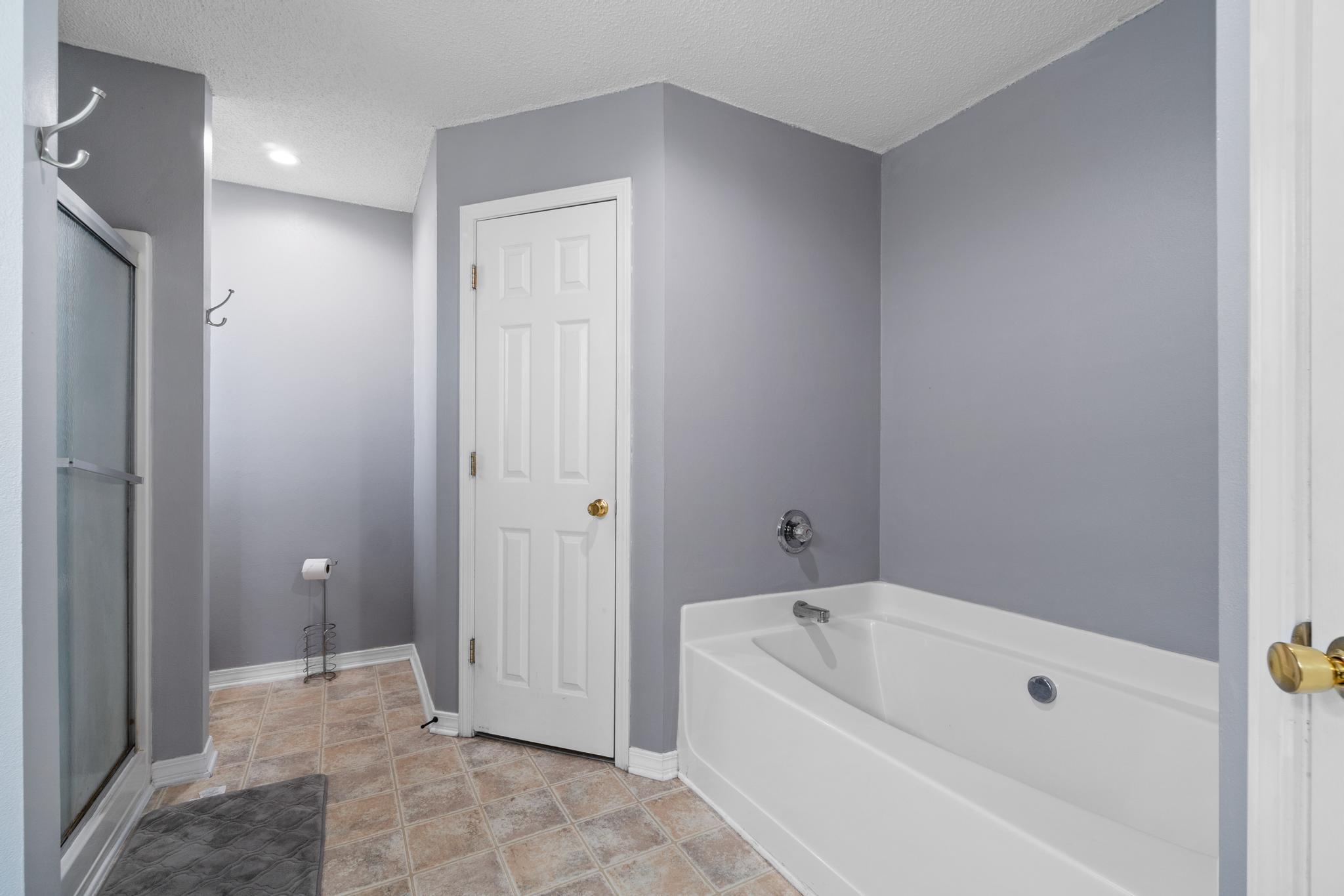 237 Trish Drive Crestview, FL 32536 - Photo 22 of 41 a bathroom with a bathtub and shower