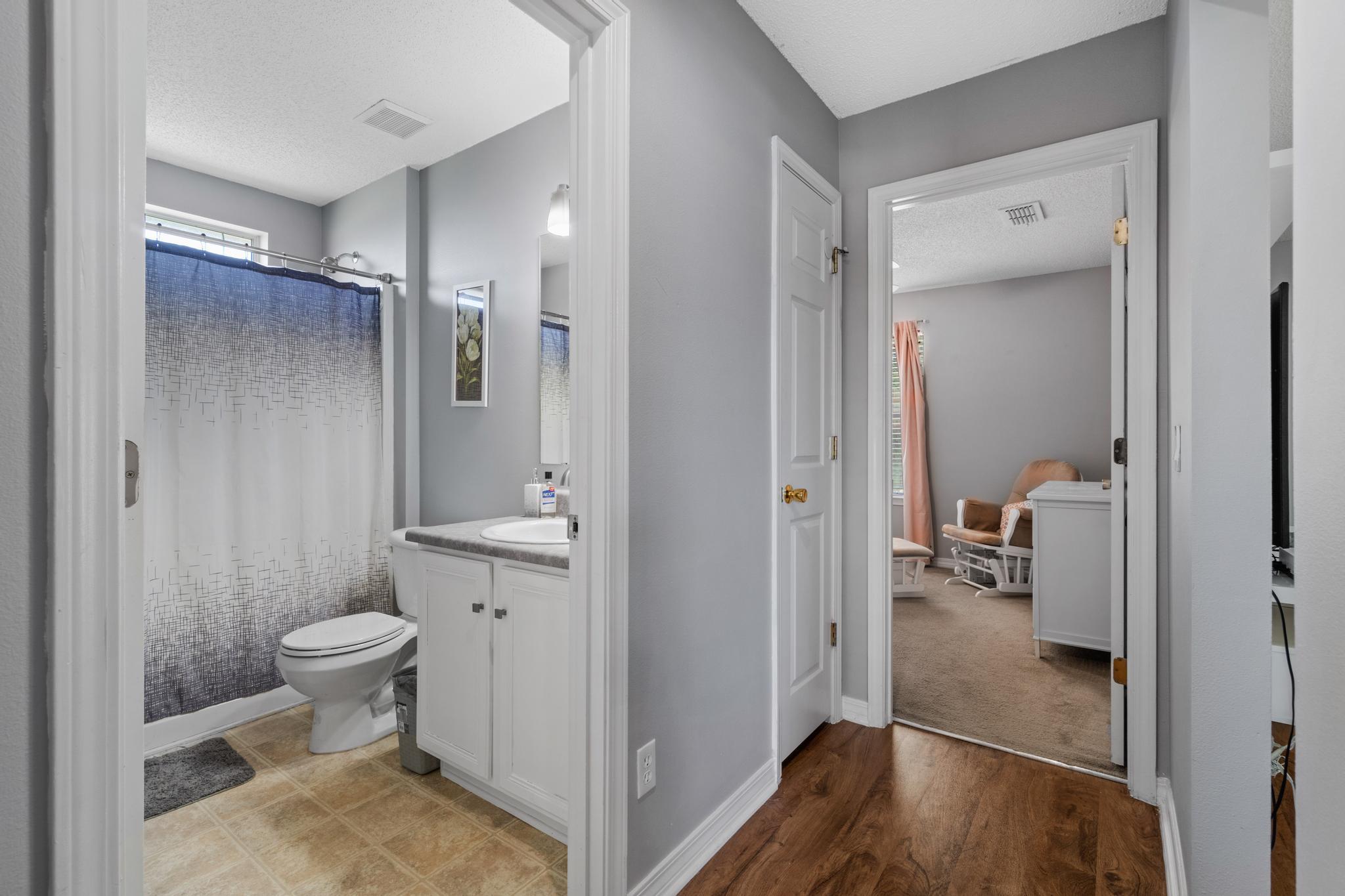 237 Trish Drive Crestview, FL 32536 - Photo 26 of 41 a bathroom with a shower toilet and a sink