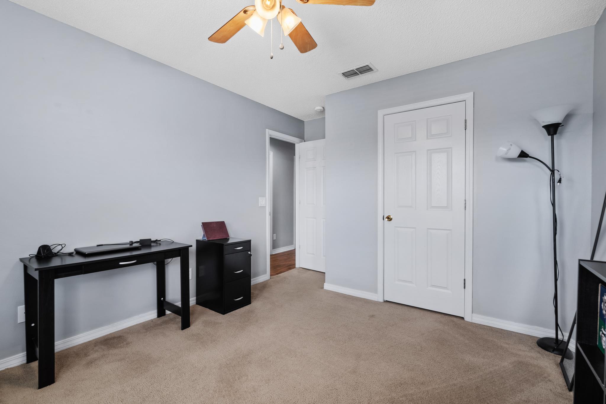 237 Trish Drive Crestview, FL 32536 - Photo 30 of 41 a view of a room with gym equipment