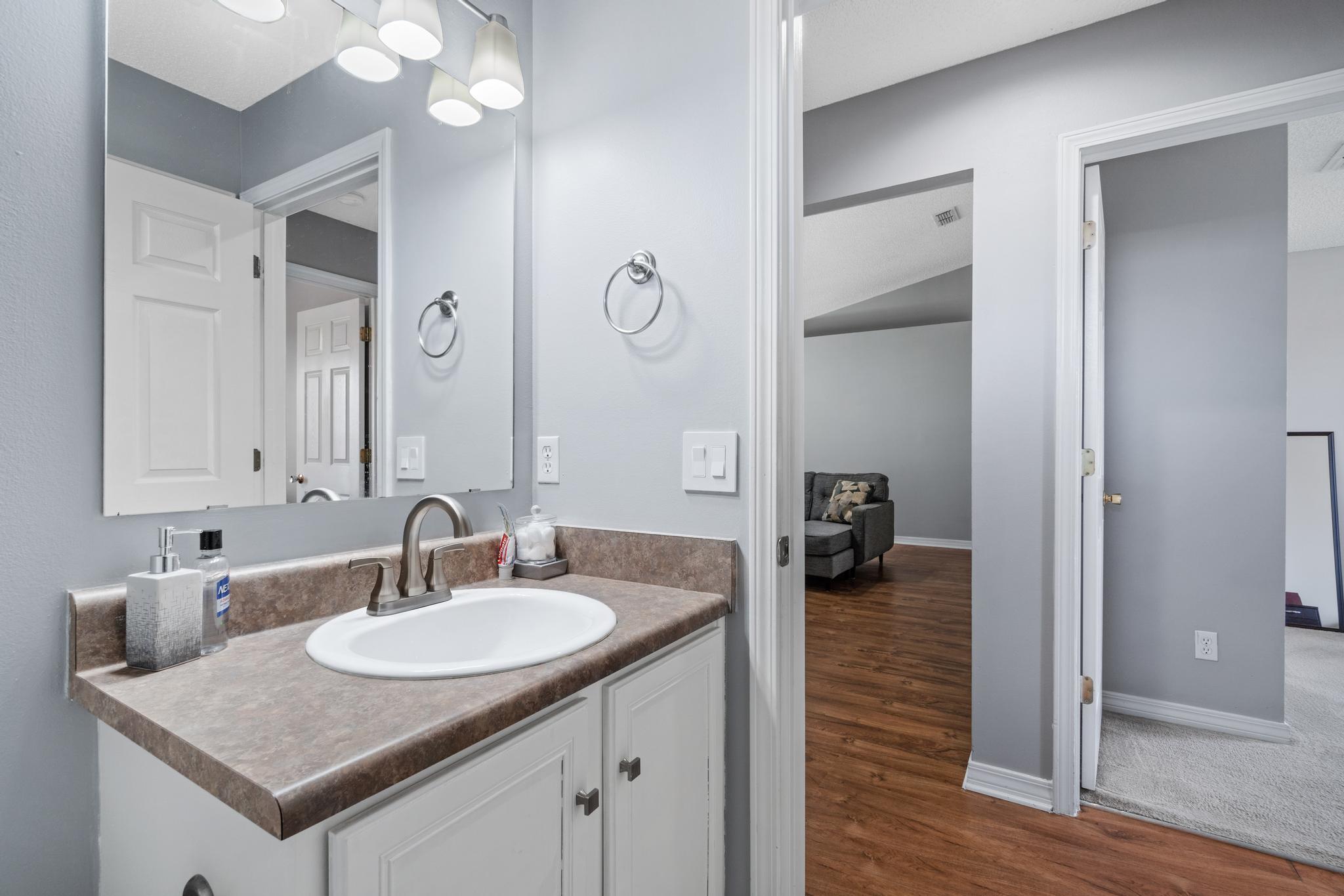 237 Trish Drive Crestview, FL 32536 - Photo 32 of 41 a bathroom with a sink double vanity and a mirror