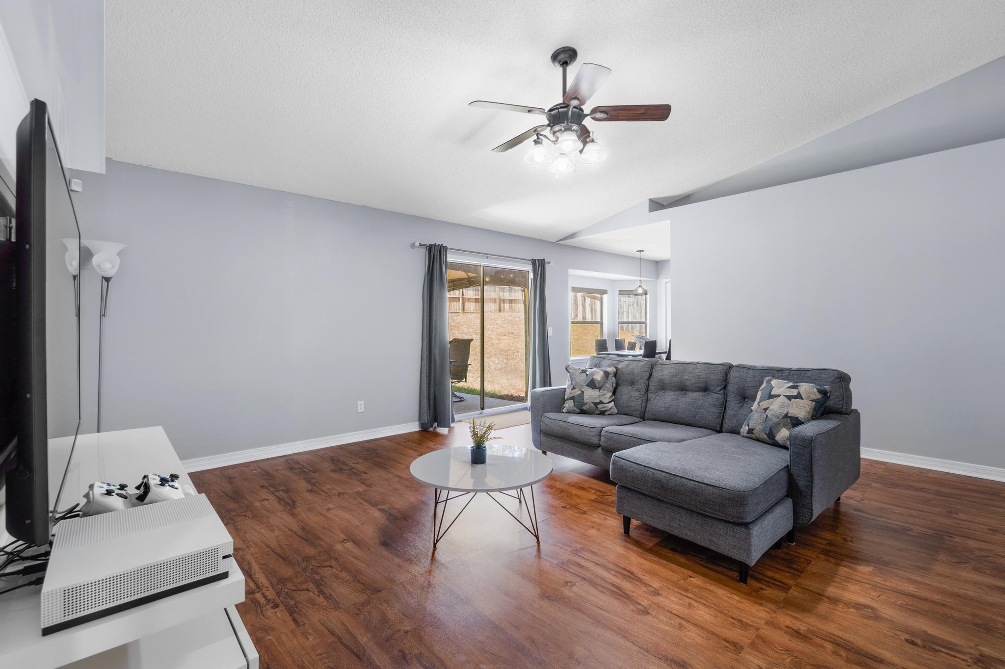 237 Trish Drive Crestview, FL 32536 - Photo 6 of 41 a living room with furniture and a wooden floor