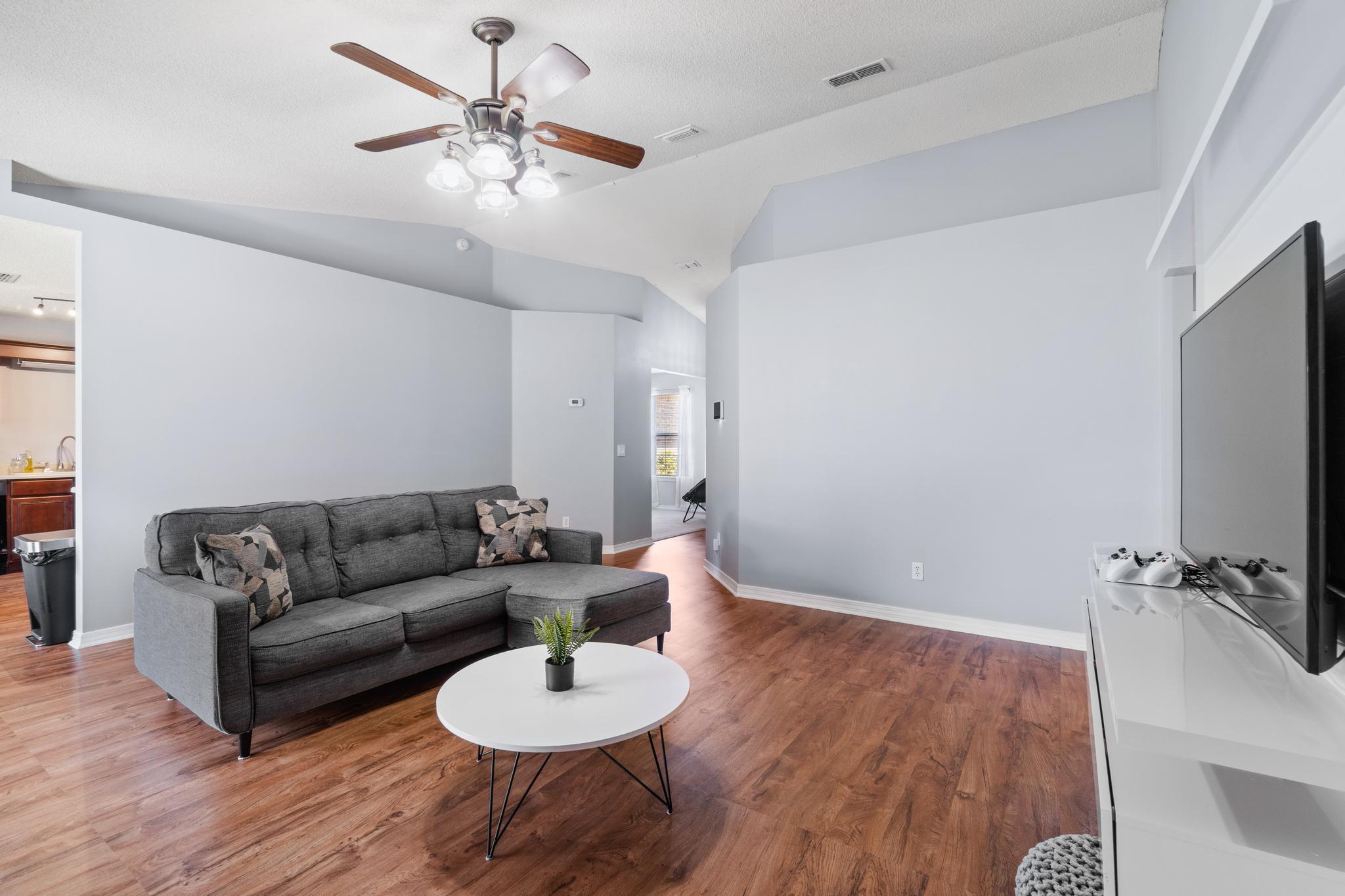 237 Trish Drive Crestview, FL 32536 - Photo 7 of 41 a living room with furniture and a flat screen tv