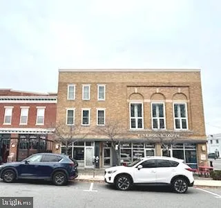a car parked in front of a building
