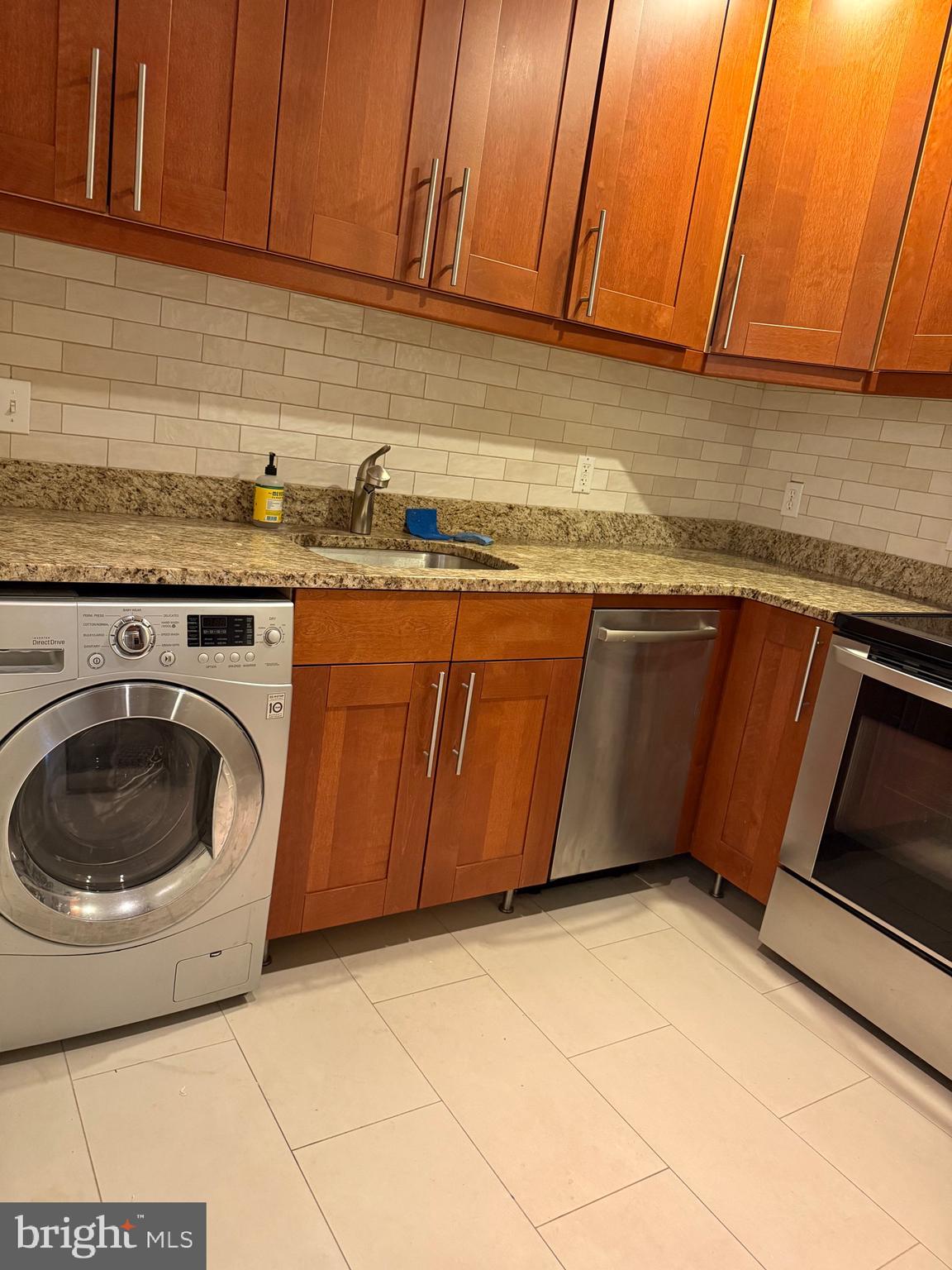 4334 Farragut Street, Unit H Hyattsville, MD 20781 - Photo 3 of 9 a close view of a sink and dishwasher in a kitchen