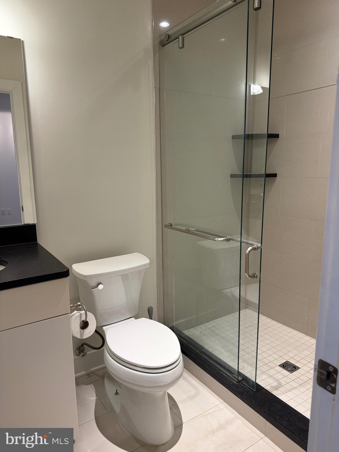 4334 Farragut Street, Unit H Hyattsville, MD 20781 - Photo 8 of 9 a bathroom with a toilet and a shower