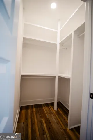 a bathroom with a toilet and a sink