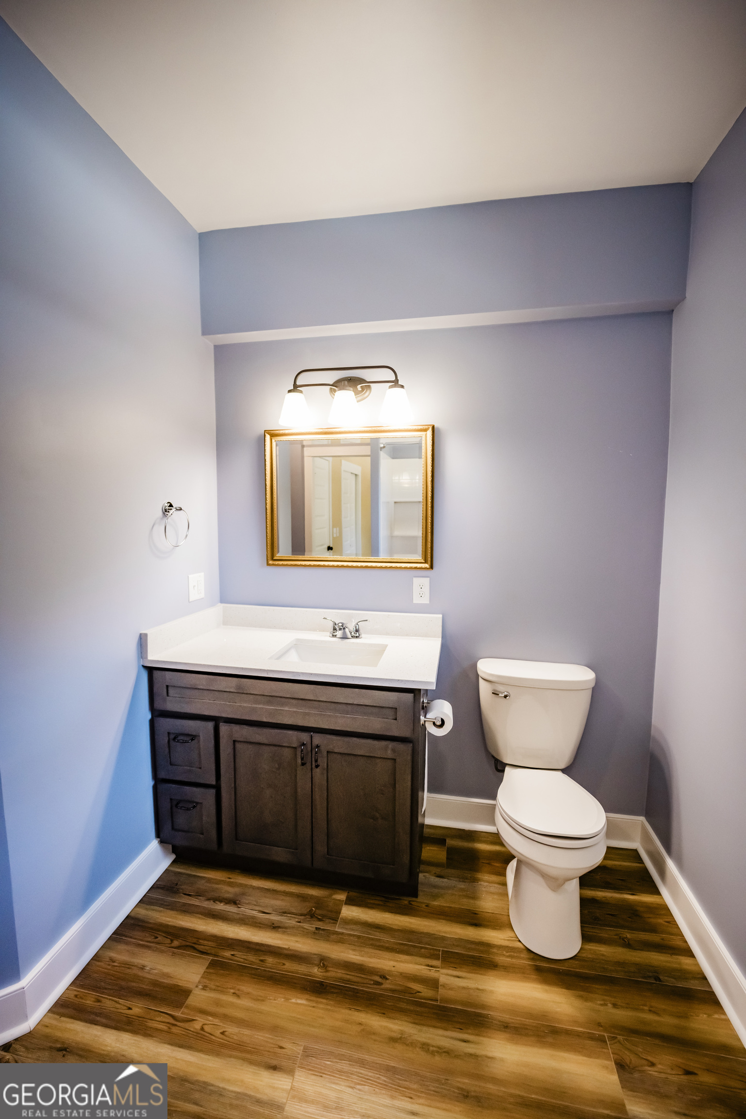 210 West 8th Street, Unit 1 Tifton, GA 31794 - Photo 15 of 23 a bathroom with a sink and a toilet