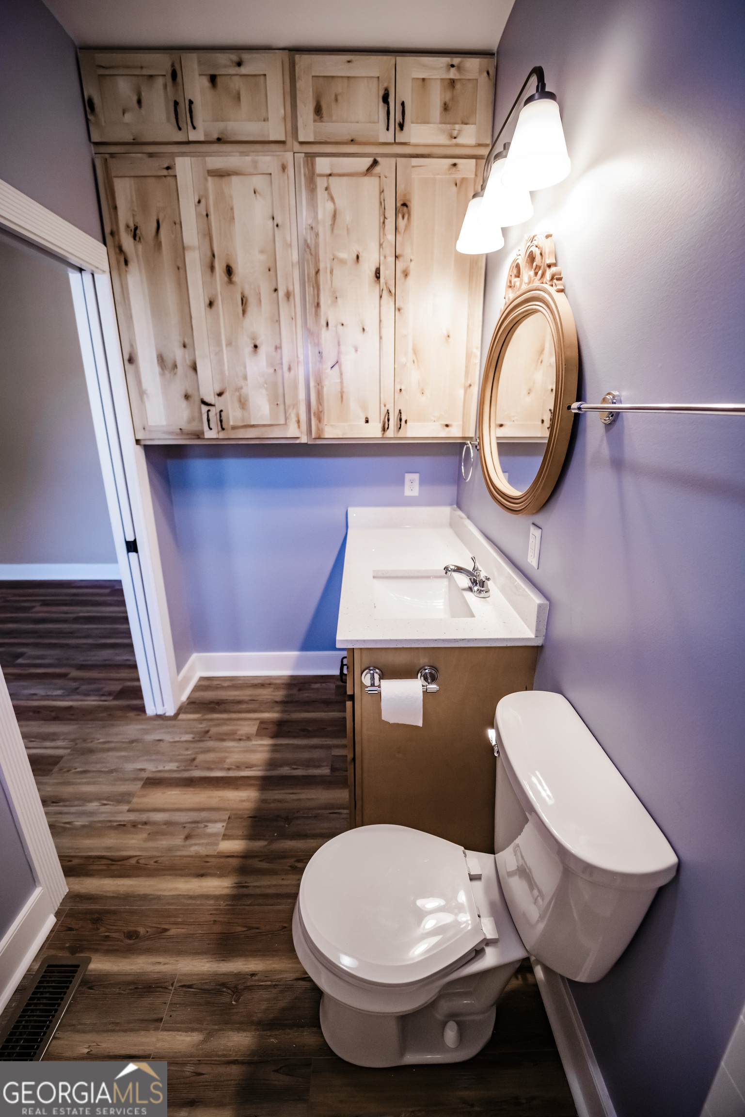 210 West 8th Street, Unit 1 Tifton, GA 31794 - Photo 16 of 23 a bathroom with a toilet and a sink