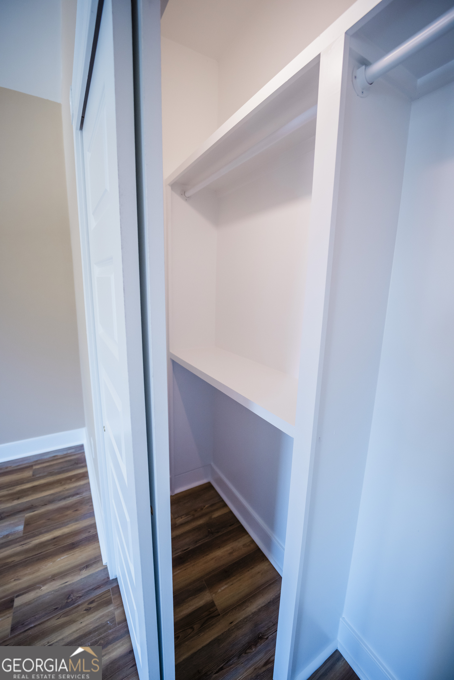 210 West 8th Street, Unit 1 Tifton, GA 31794 - Photo 20 of 23 a view of staircase with wooden floor