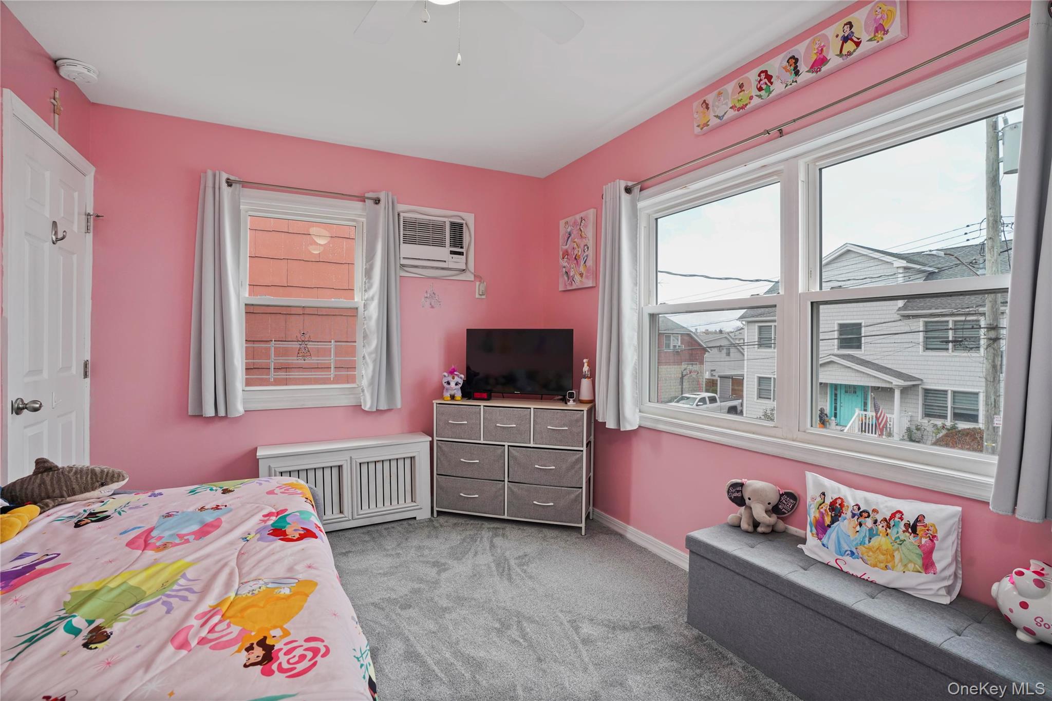 48 Gotham Avenue Brooklyn, NY 11229 - Photo 20 of 38 a bedroom with a bed and a tv