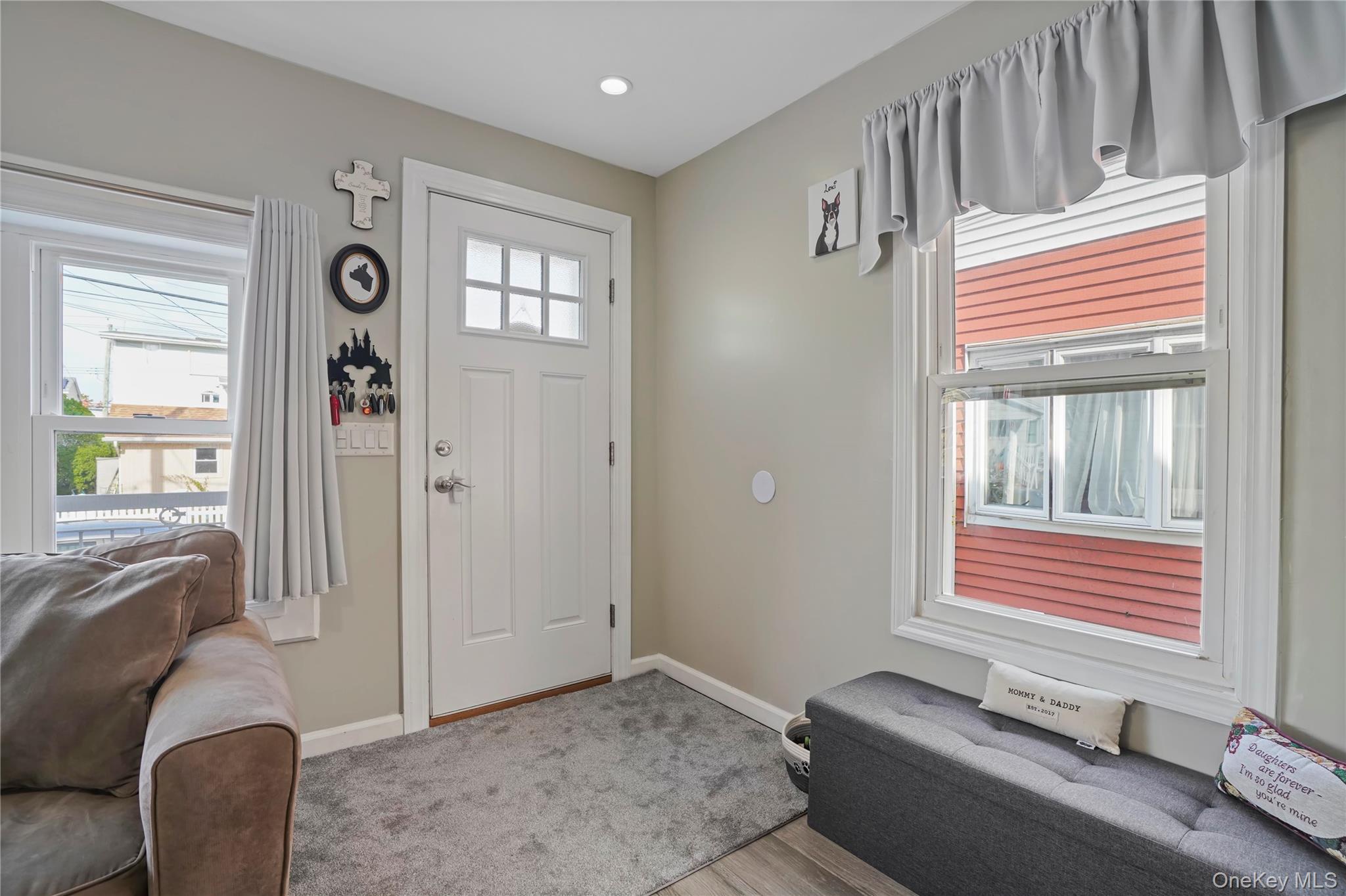 48 Gotham Avenue Brooklyn, NY 11229 - Photo 24 of 38 a living room with furniture and window