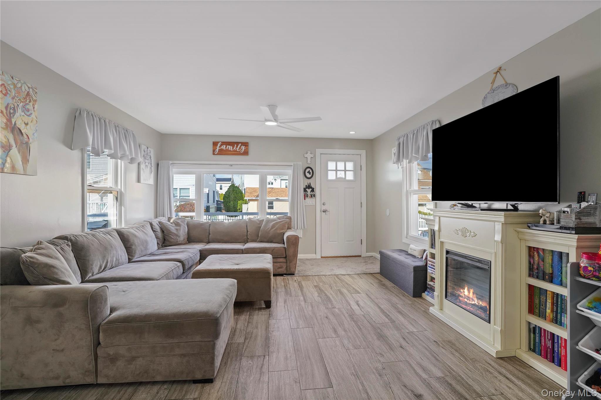 48 Gotham Avenue Brooklyn, NY 11229 - Photo 5 of 38 a living room with furniture and a flat screen tv