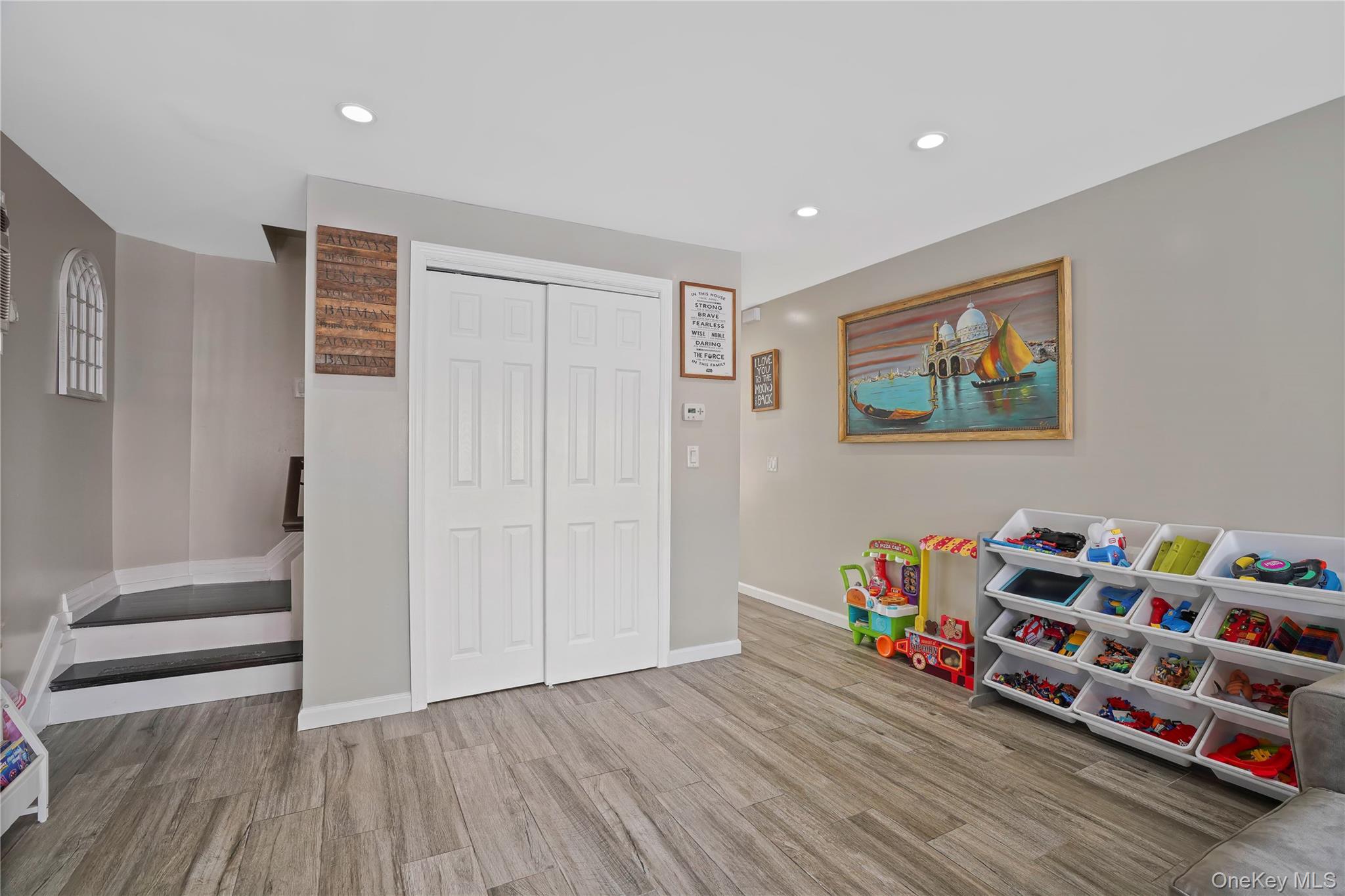 48 Gotham Avenue Brooklyn, NY 11229 - Photo 8 of 38 a room with toys and wooden floor