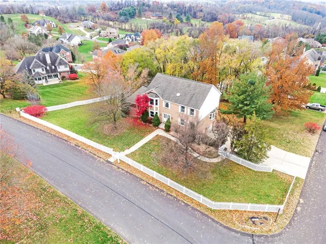 a view of a wooden floor with a yard