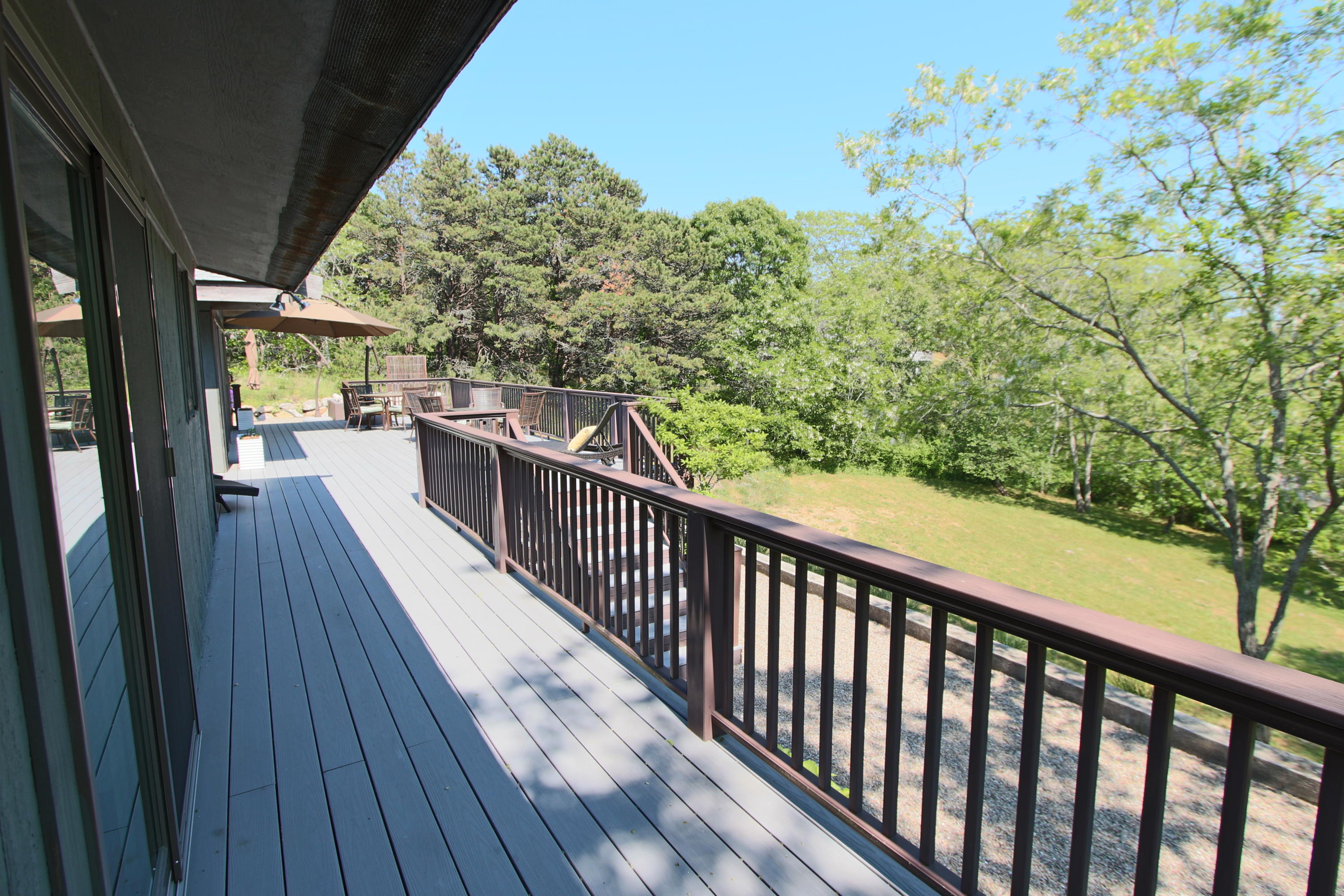 2 Katharine Road Truro, MA 02666 - Photo 11 of 60 a view of a balcony with wooden floor