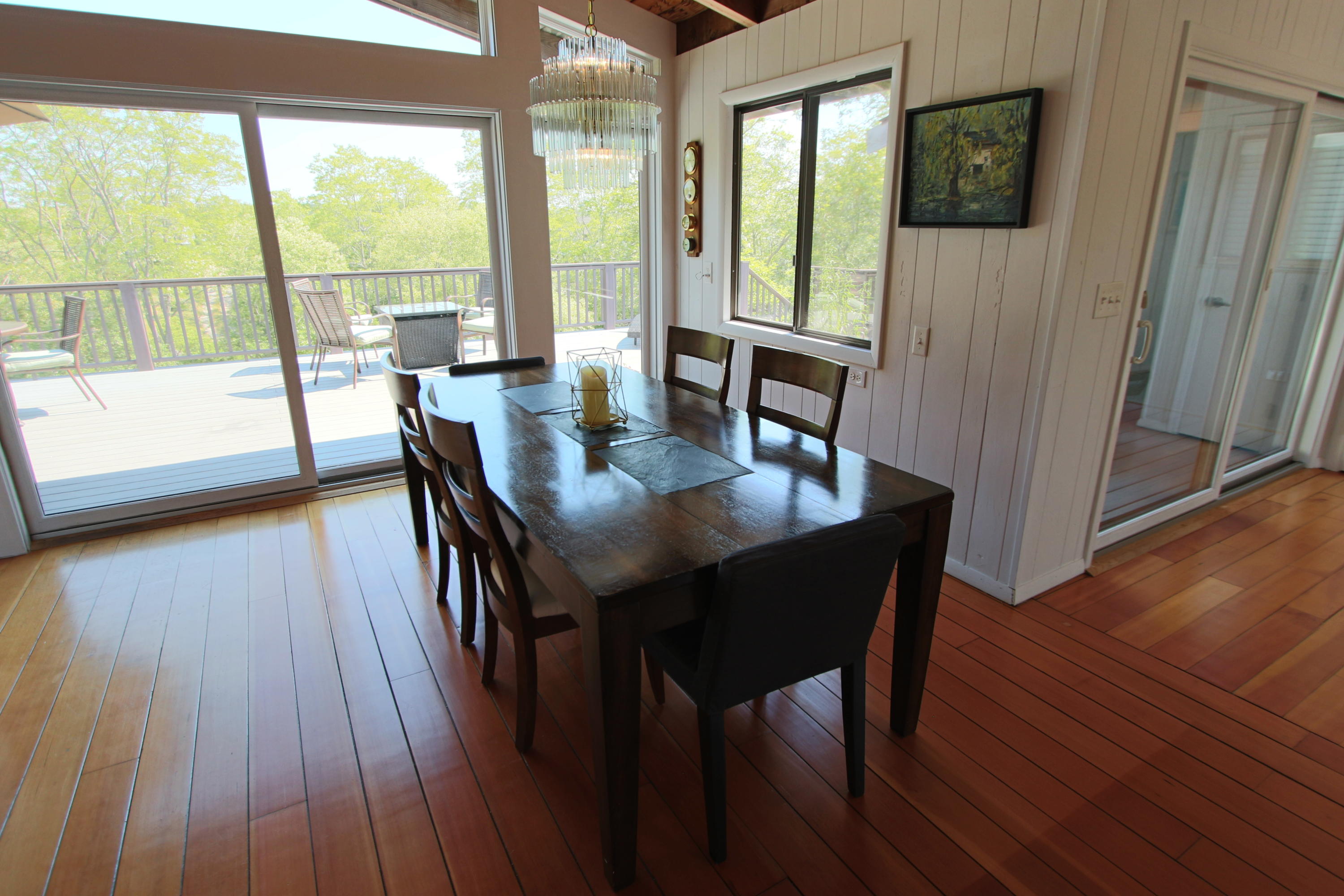 2 Katharine Road Truro, MA 02666 - Photo 19 of 60 a view of a dining room with furniture window and wooden floor