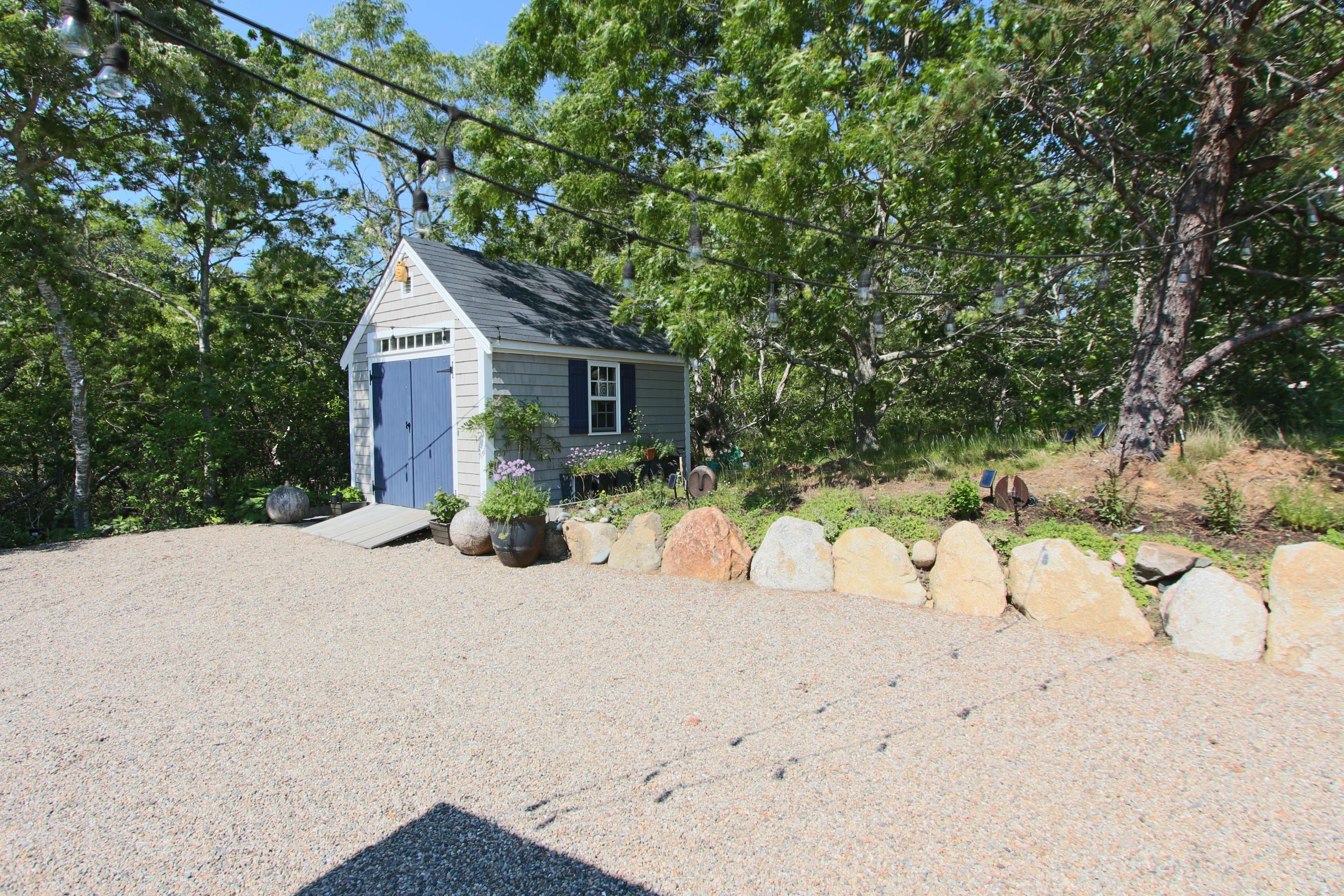 2 Katharine Road Truro, MA 02666 - Photo 37 of 60 a view of a house with a snow in the yard