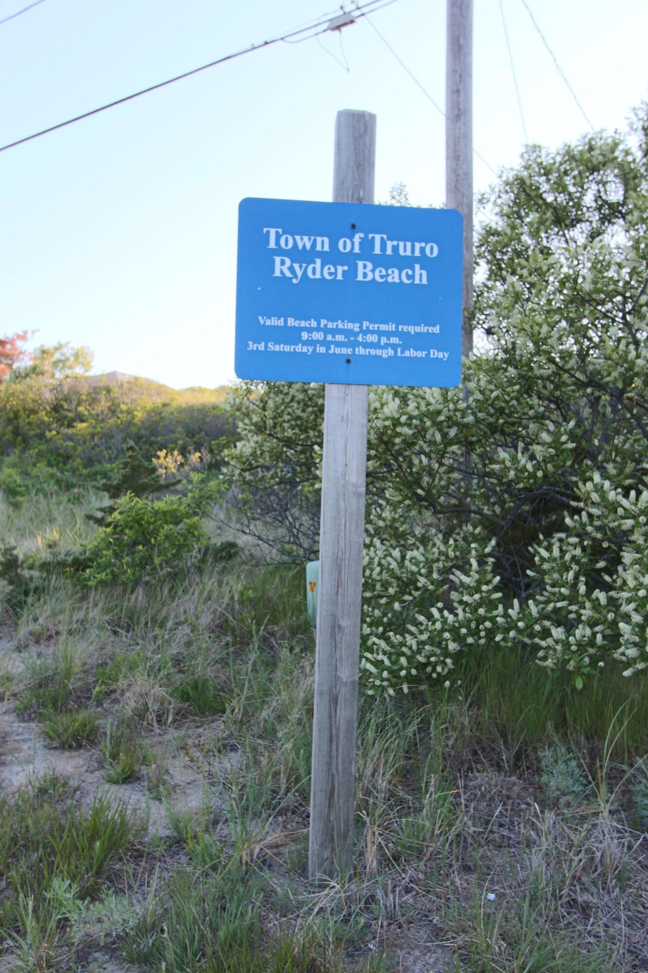 2 Katharine Road Truro, MA 02666 - Photo 43 of 60 a sign that is sitting on a brick wall