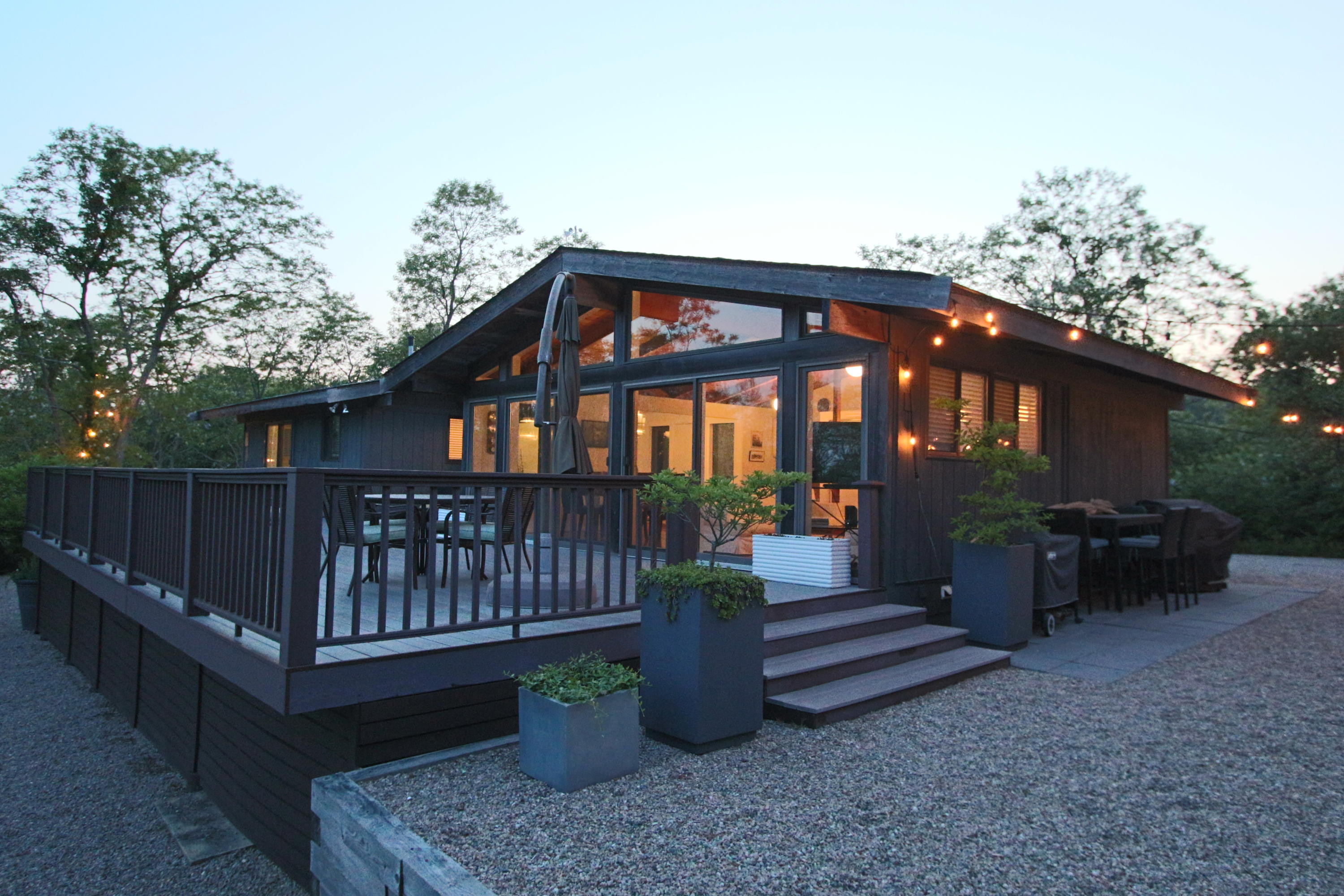 2 Katharine Road Truro, MA 02666 - Photo 51 of 60 a view of a deck with furniture and a yard
