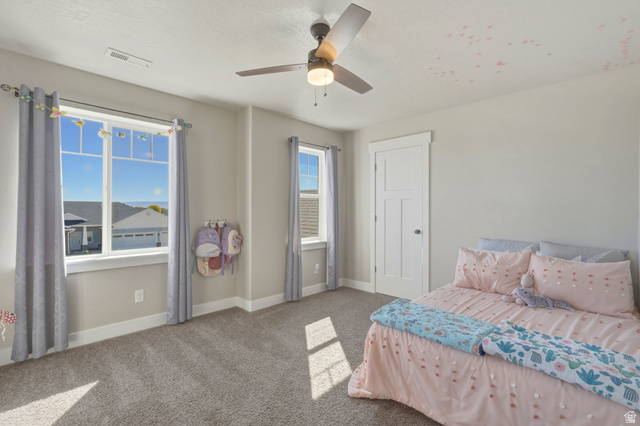 836 South 250 West Vernal, UT 84078 - Photo 37 of 56 Bedroom featuring carpet flooring and ceiling fan