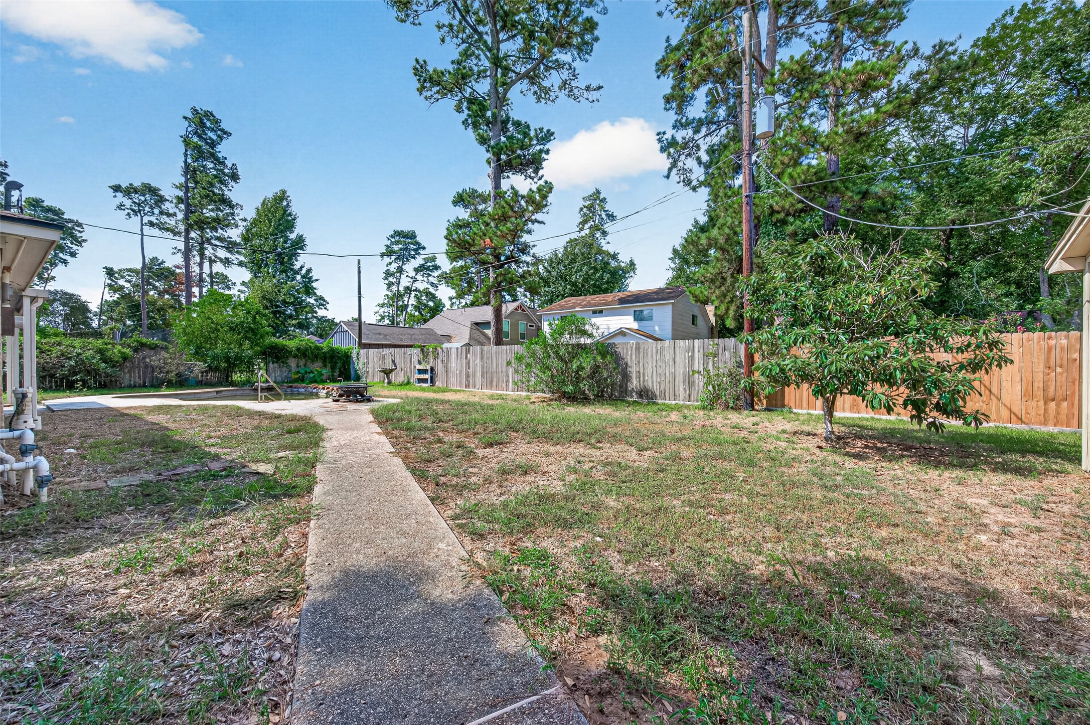10211 Kerr Lane Conroe, TX 77385 - Photo 45 of 45 Side yard