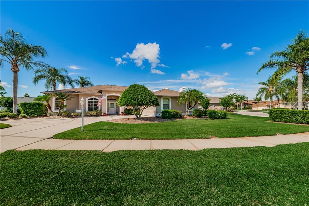 a view of a house with a big yard