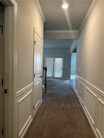 a view of hallway with stairs