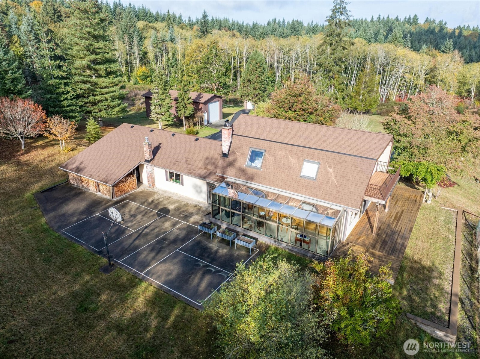 201 Crego Ridge Road Chehalis, WA 98532 - Photo 2 of 38 an aerial view of a house with a yard and lake view