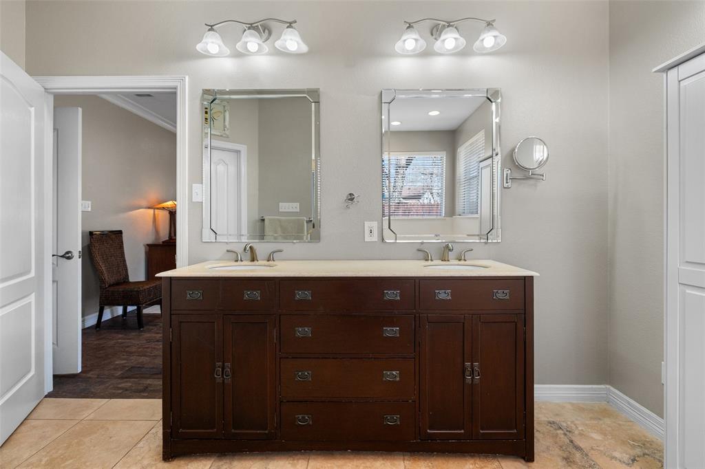8903 Ravenswood Road Granbury, TX 76049 - Photo 19 of 36 Ensuite Vanity With Stone Counter & Dual Sinks