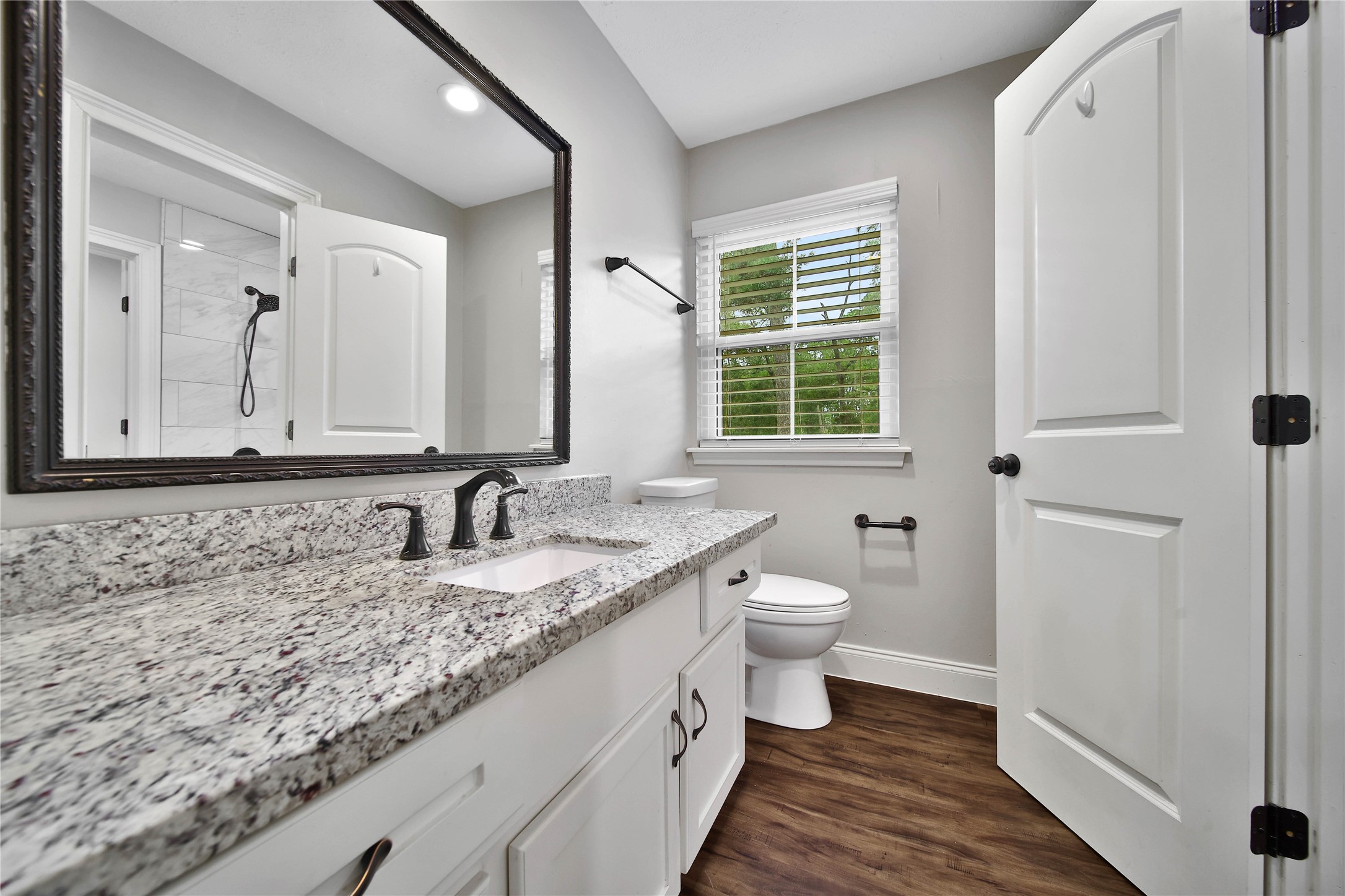 6407 Craigway Road Spring, TX 77389 - Photo 21 of 47 This bedroom offers a private entrance to the Hollywood bath and its own sink and toilet.