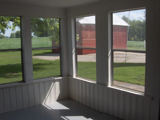 1712 Manchester Road South Beloit, IL 61080 - Photo 10 of 10 a view of backyard with large window and wooden floor