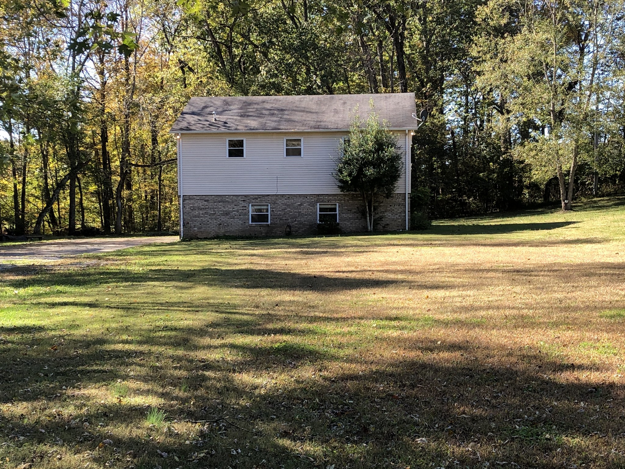 7535 Webster Road Greenbrier, TN 37073 - Photo 2 of 23 a view of a house with a swimming pool