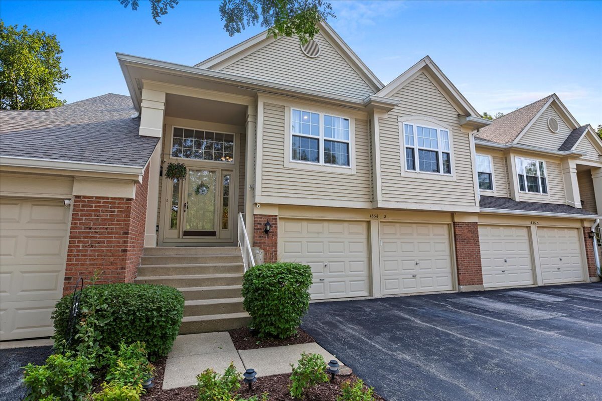 1636 Columbia Circle, Unit 2 Bartlett, IL 60103 - Photo 1 of 47 front view of a house