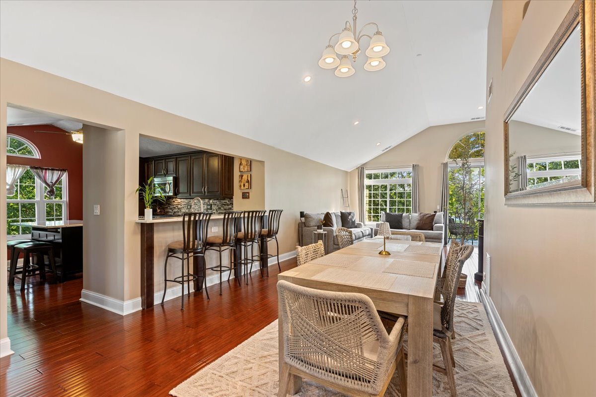 1636 Columbia Circle, Unit 2 Bartlett, IL 60103 - Photo 12 of 47 a view of a dining room with furniture window and wooden floor