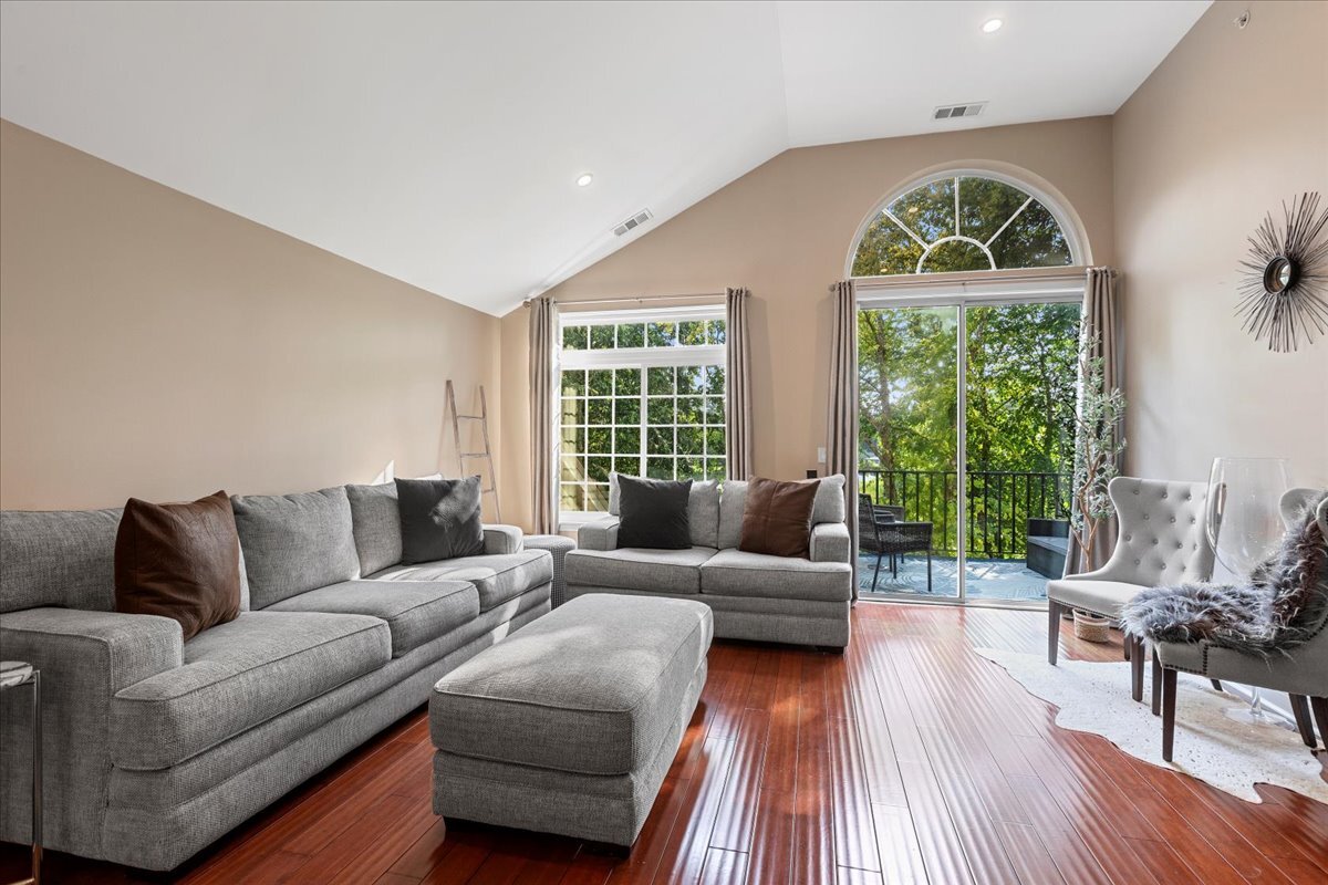 1636 Columbia Circle, Unit 2 Bartlett, IL 60103 - Photo 15 of 47 a living room with furniture and a large window